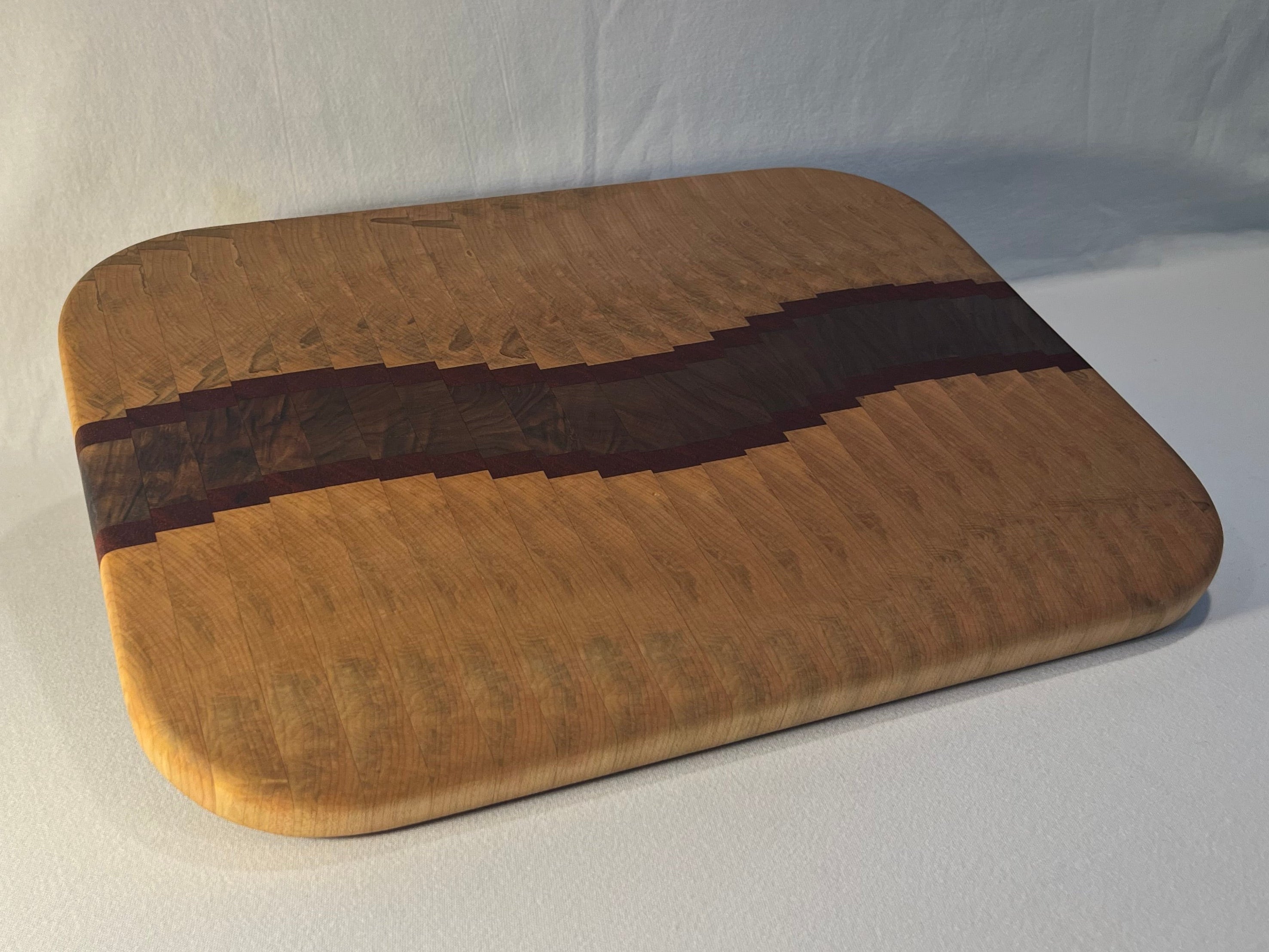 Maple, Walnut, and Paduk end grain wave  cutting board