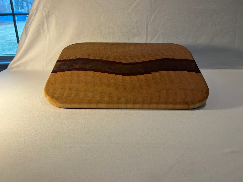 Maple, Walnut, and Paduk end grain wave  cutting board