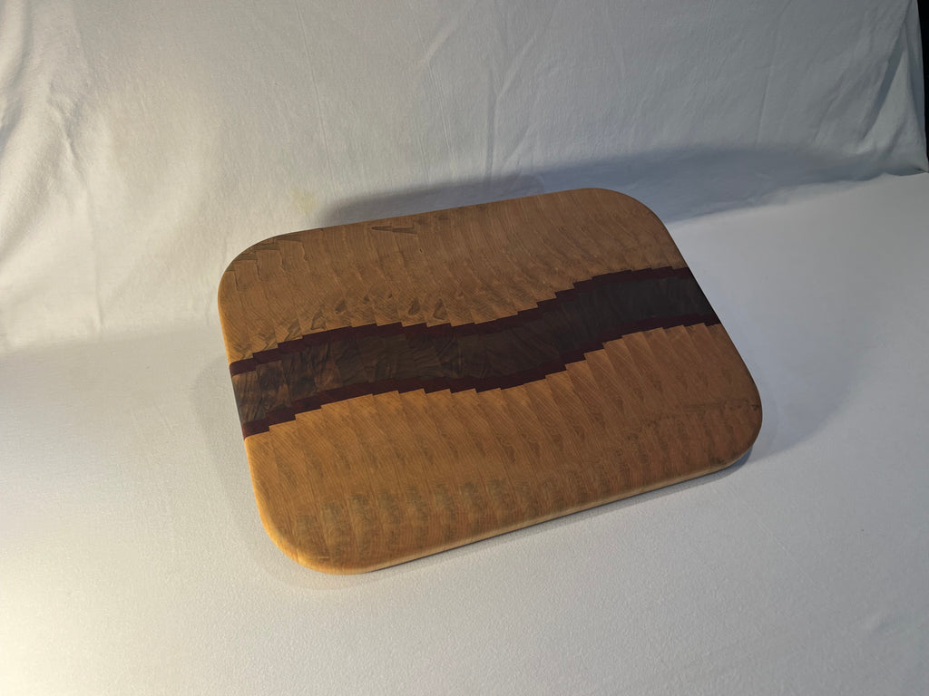 Maple, Walnut, and Paduk end grain wave  cutting board