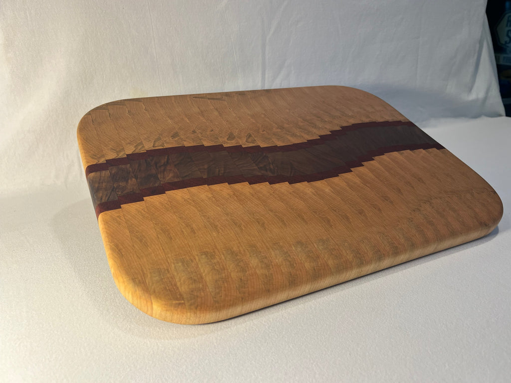 Maple, Walnut, and Paduk end grain wave  cutting board