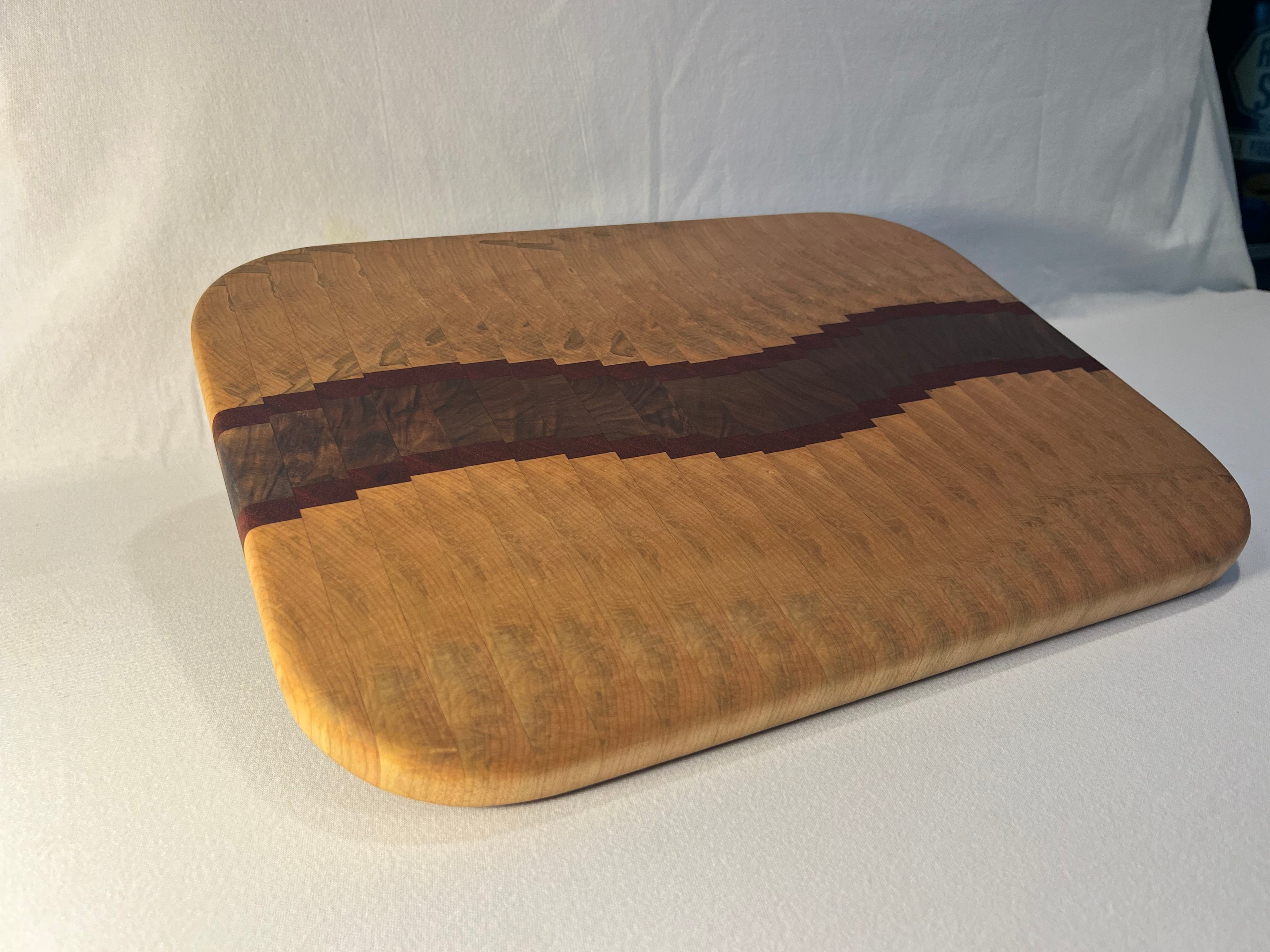 Maple, Walnut, and Paduk end grain wave  cutting board