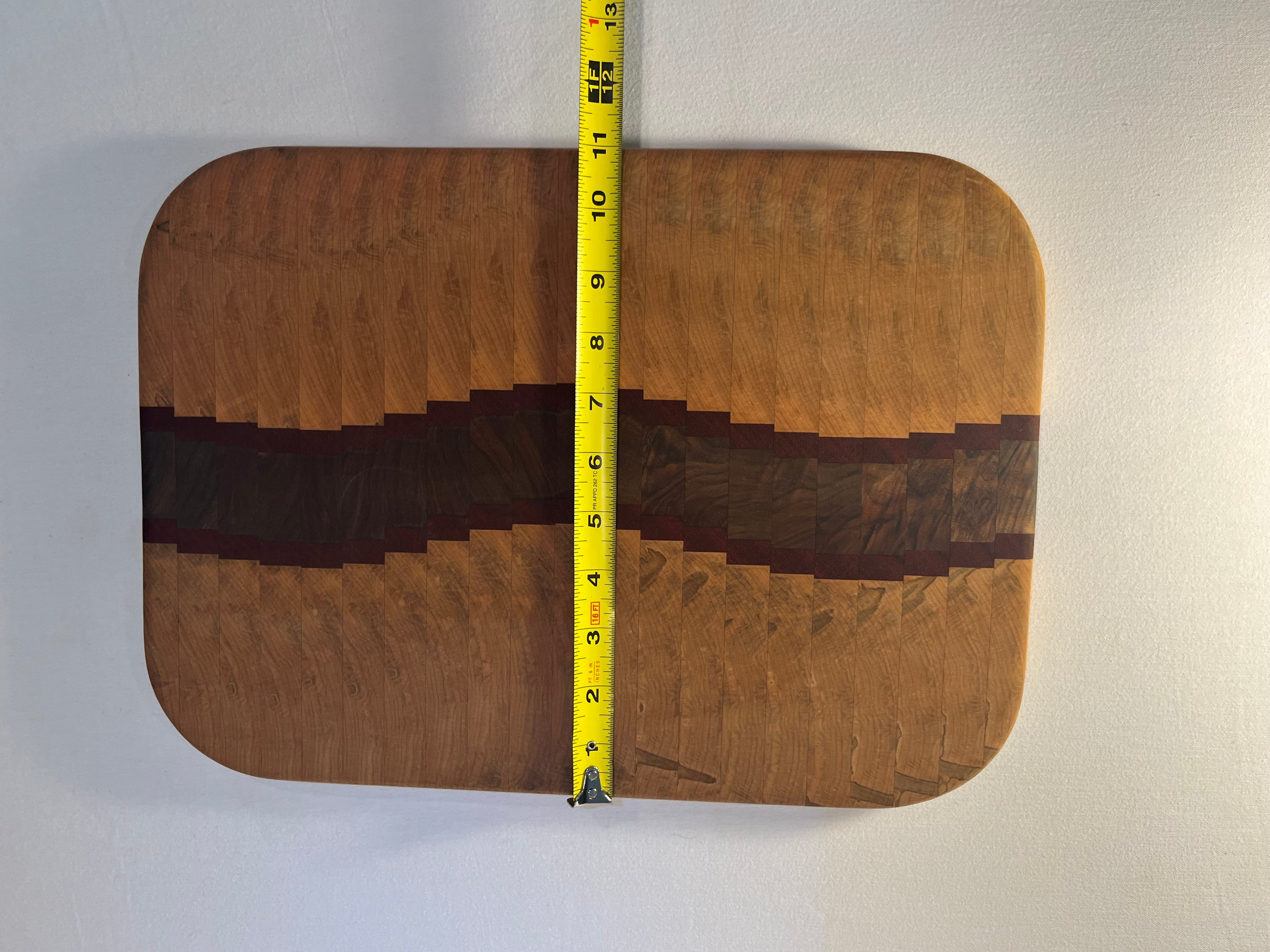 Maple, Walnut, and Paduk end grain wave  cutting board
