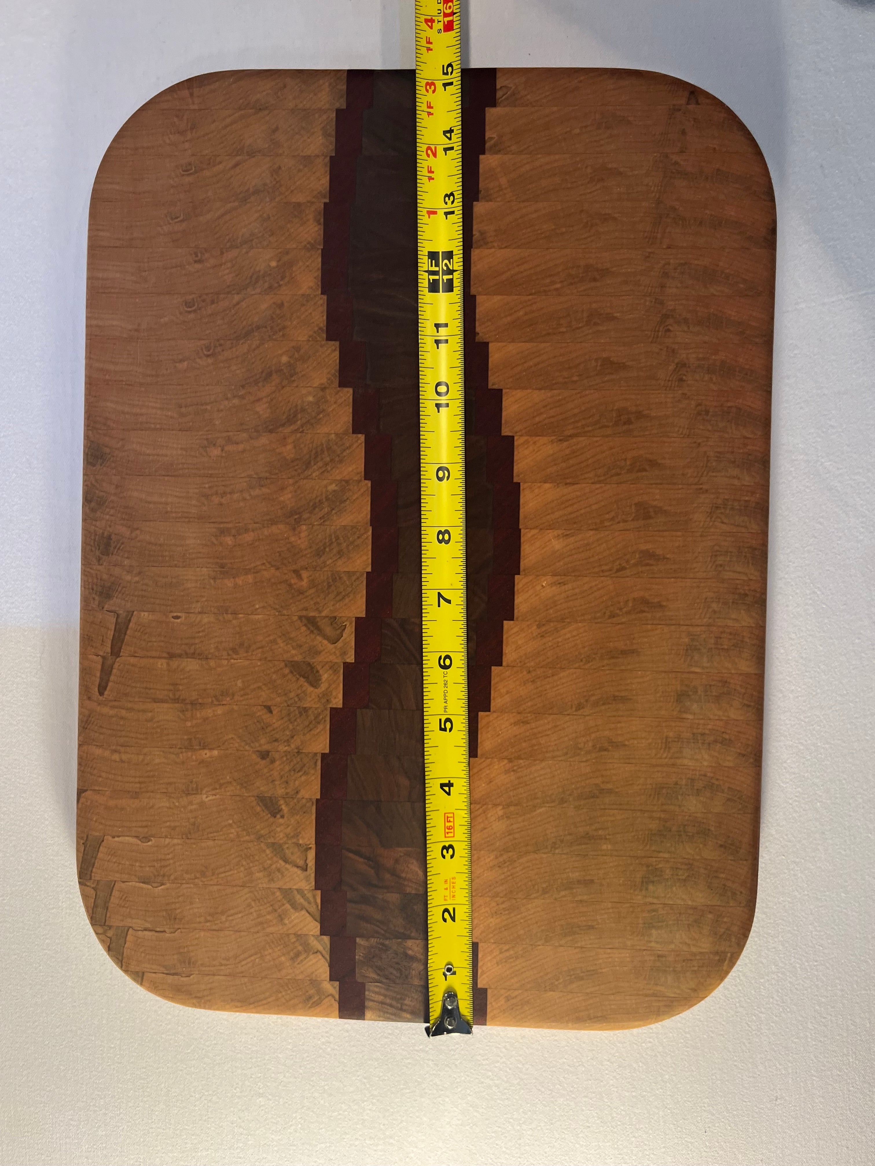 Maple, Walnut, and Paduk end grain wave  cutting board